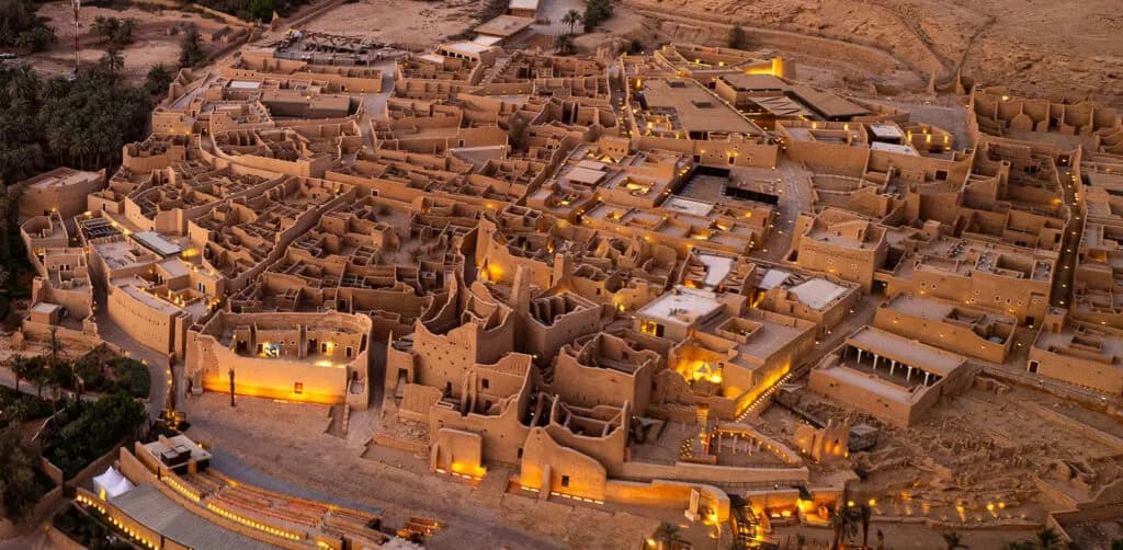 At-Turaif mud-brick district in Diriyah lit at dusk