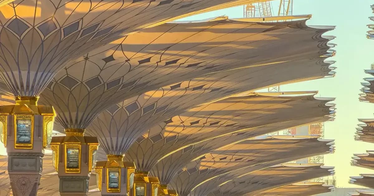 Sunlit umbrella canopies in the courtyard of Al-Masjid an-Nabawi in Madinah