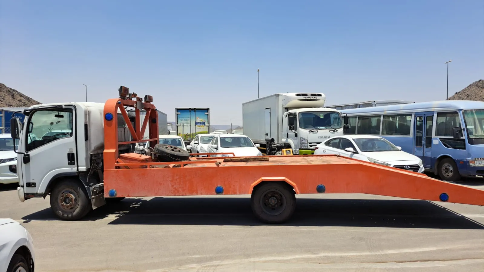 Dammam flatbed tow truck (satha) recovering a car